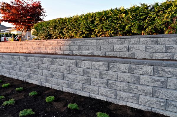 Concrete Retaining Wall Installation in Forney